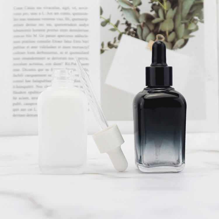 Gradient black white dropper bottle