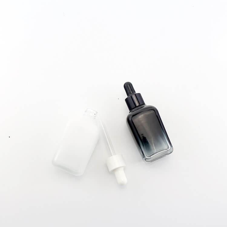 Gradient black white dropper bottle