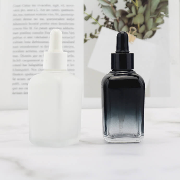 Gradient black white dropper bottle