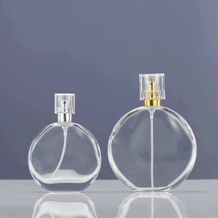 Wholesale Round Perfume Bottle 50ml 100ml Empty Clear Perfume Glass Spray Bottle