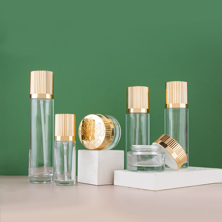 Wholesale Luxury Cosmetic Glass Bottle Set Skin Care Glass Bottles With Gold Lid